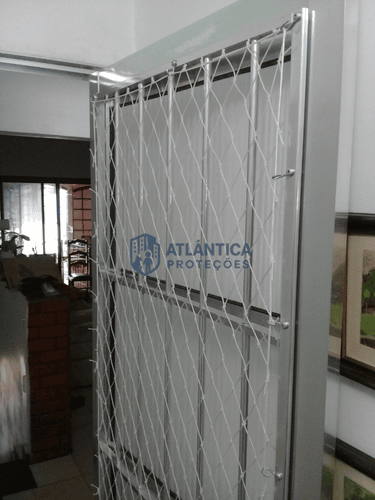 REDES DE PROTEÇÃO EM PORTA